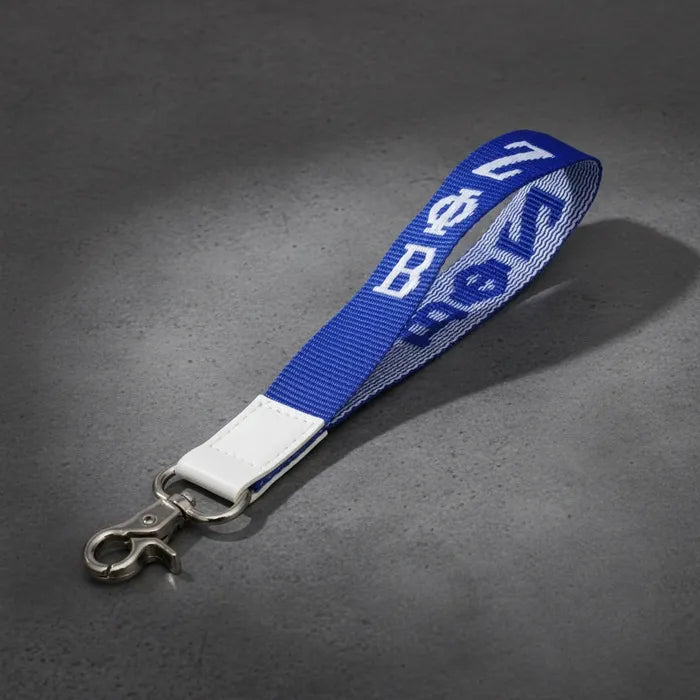 Zeta Embroidered Wristlet