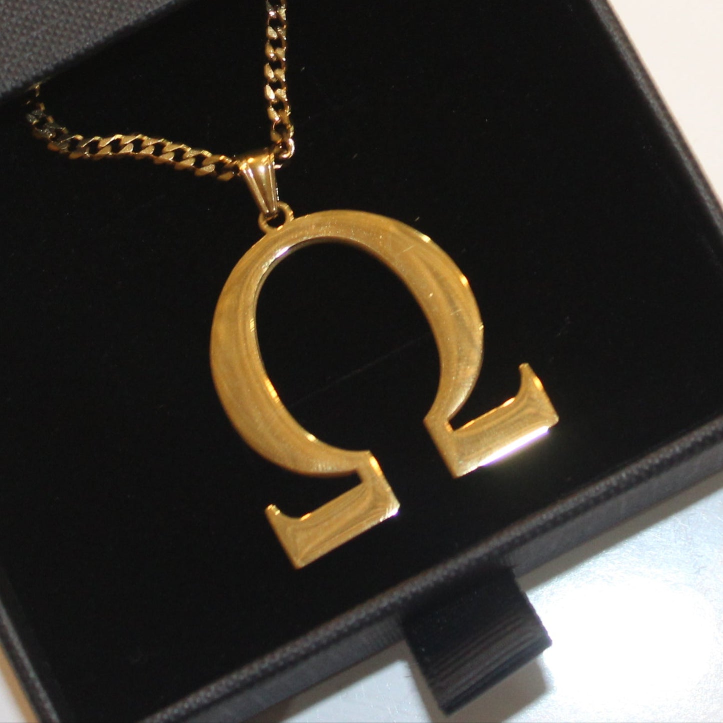 Omega Psi Phi Fraternity, Inc. "Omega" necklace