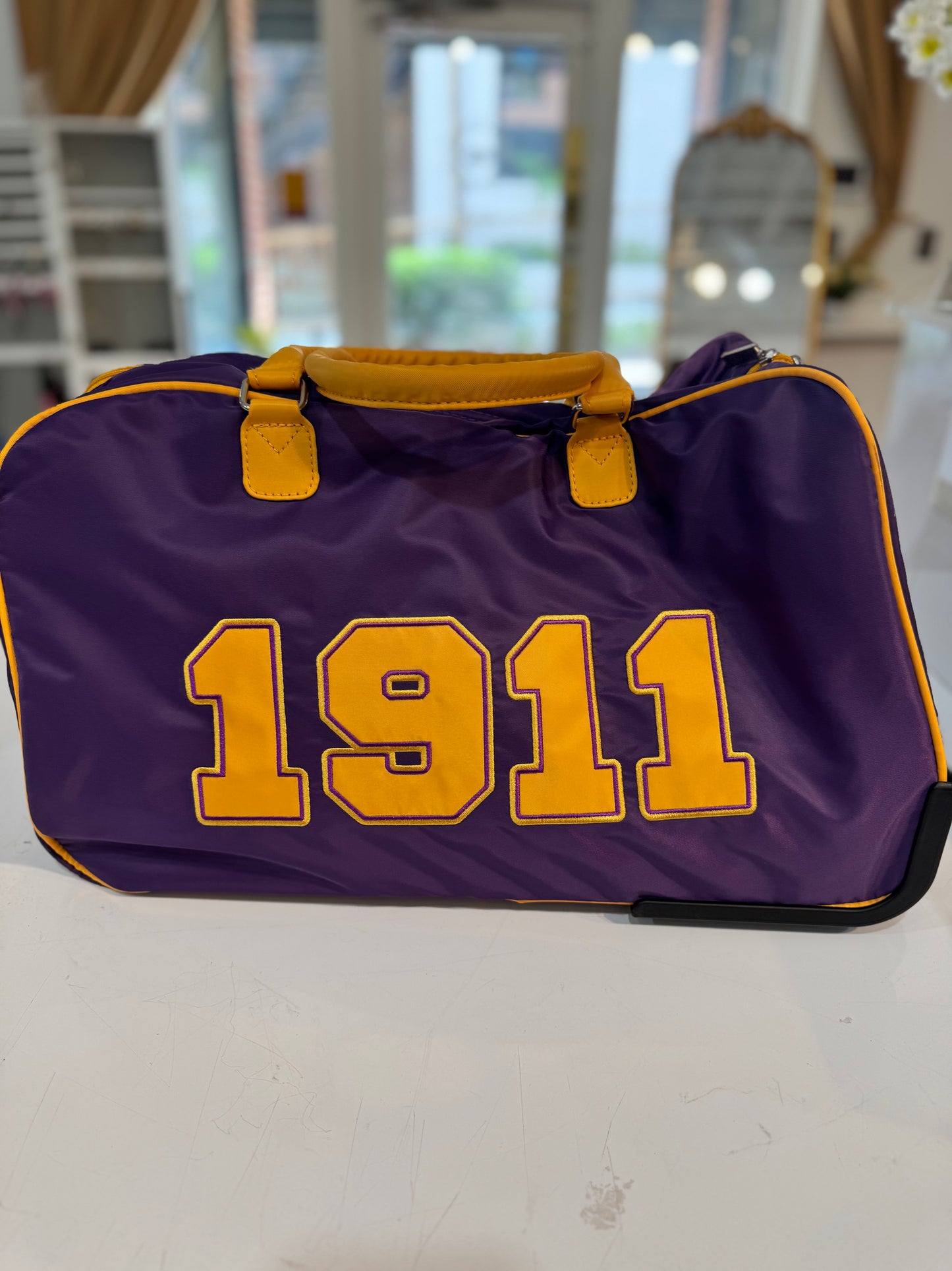 Omega Psi Phi Rolling Trolley Bag