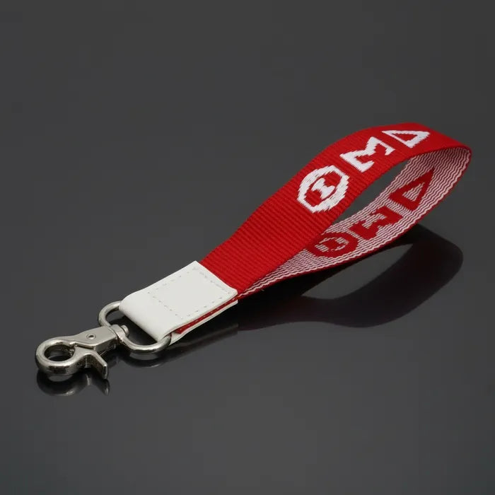 Delta Embroidered Wristlet