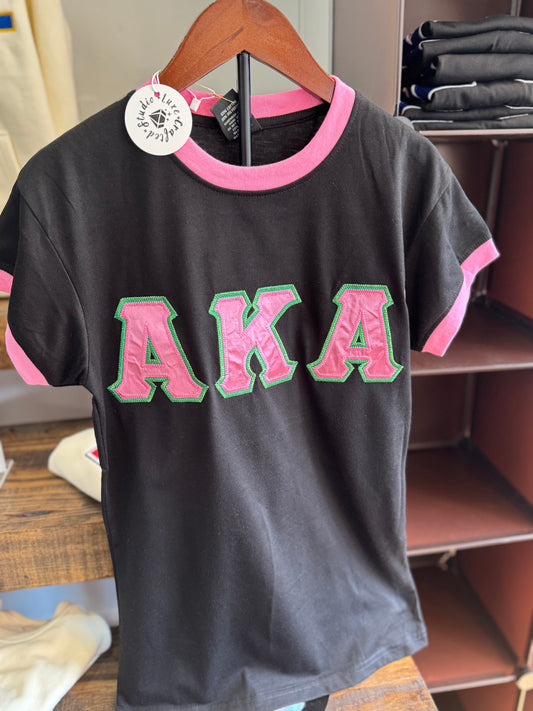 AKA® Embroidered Satin Greek Letters Tee (Black)